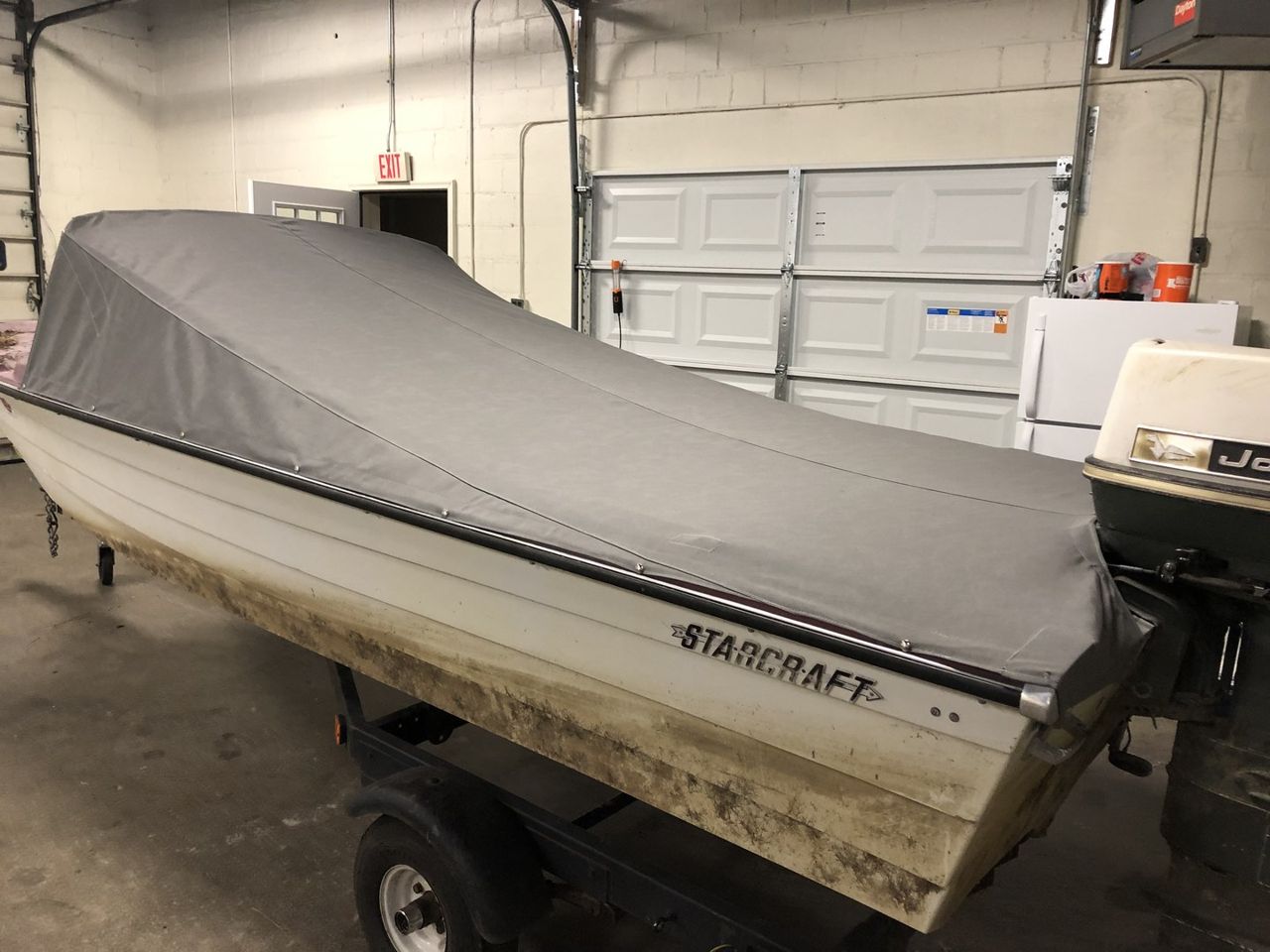 View Fitted gray boat cover